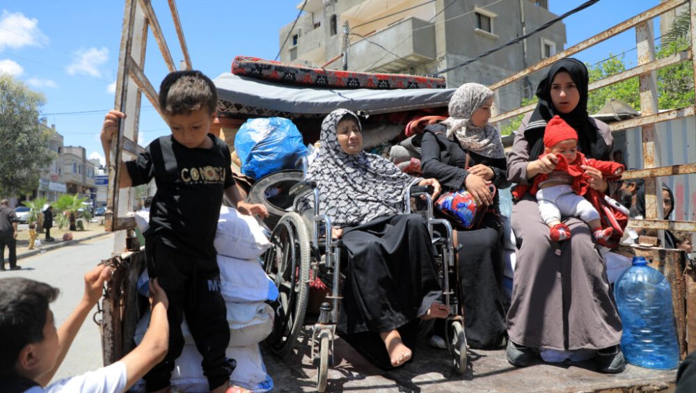 Displaced Palestinians fleeing from the ongoing bombardment of their homeland in Gaza, Palestine